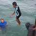 Minhaal jumps into the deep water as part of the Soneva Learn-to-Swim programme